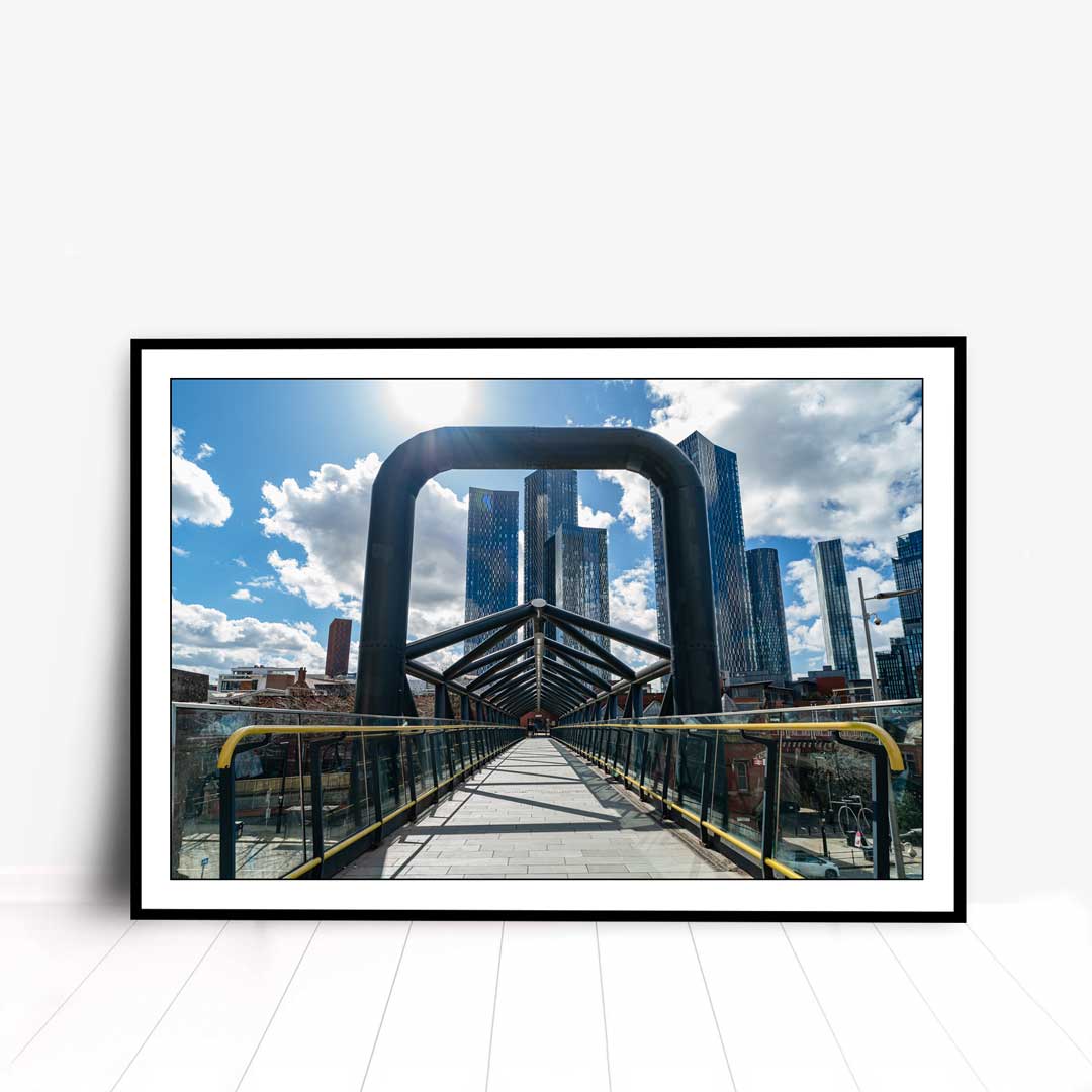 This is a photographic print of the Manchester Deansgate-Castlefield Bridge that connects the Castlefield tram stop to the Deansgate train station.