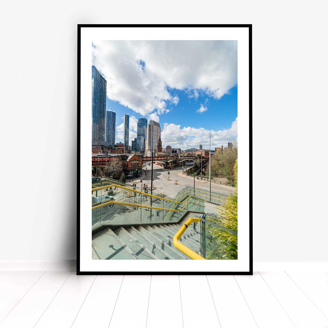This is a photographic print of the Manchester Deansgate-Castlefield Bridge that connects the Castlefield tram stop to the Deansgate train station.