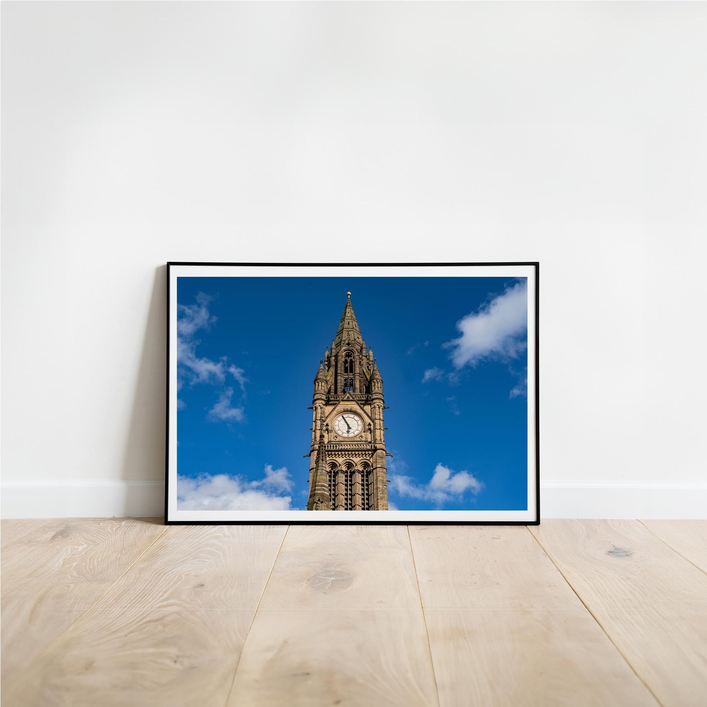 This is a photographic print of the Manchester Town Hall.