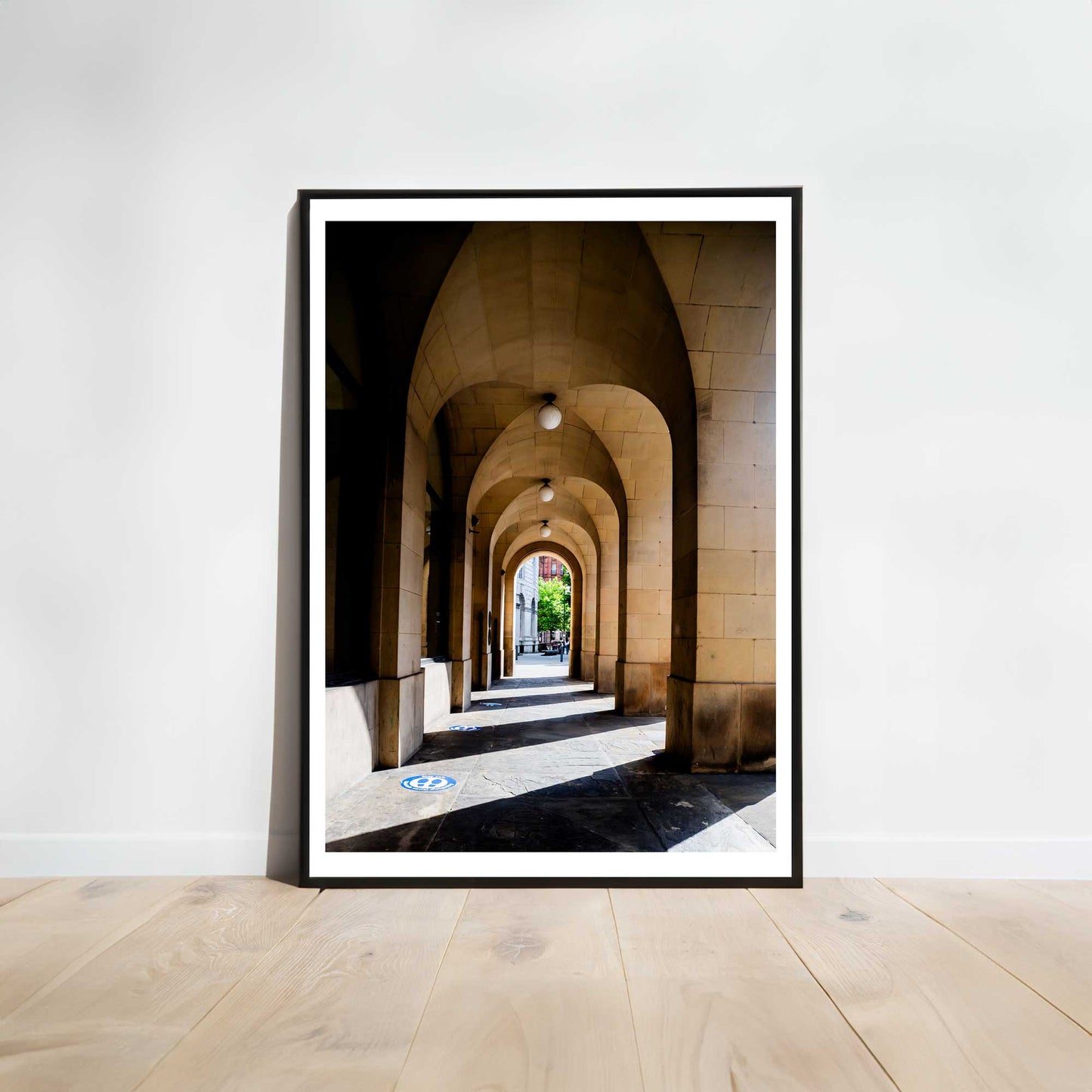 This is a photographic print of the archways at Manchester Town Hall.