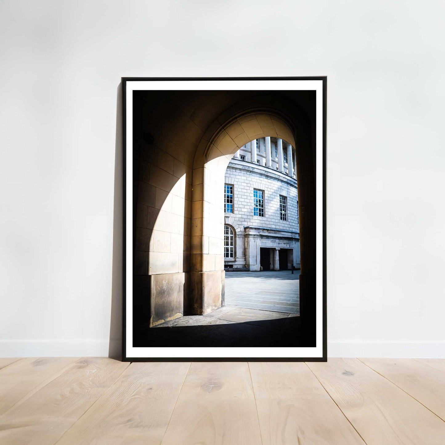 This is a photographic print of the archways at Manchester Town Hall.