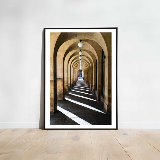 This is a photographic print of the archways at Manchester Town Hall.