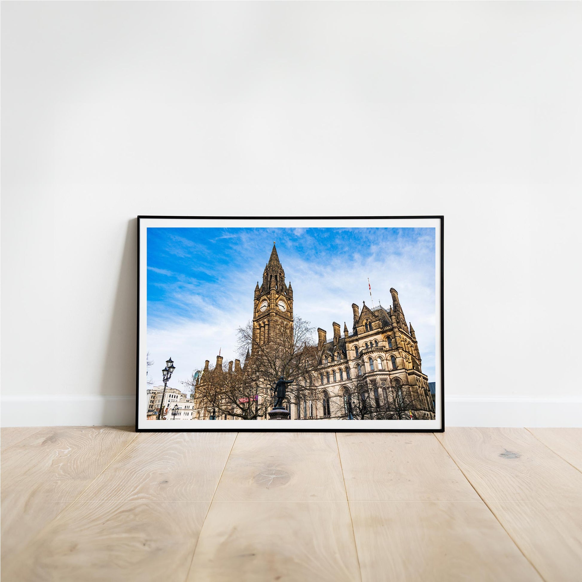 This is a photographic print of the Manchester Town Hall.