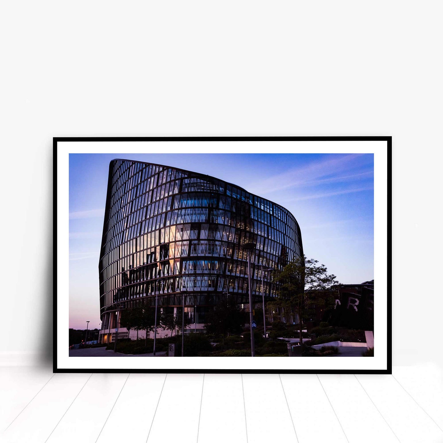 Photographic print of One Angel Square which is an office building in Manchester, England.