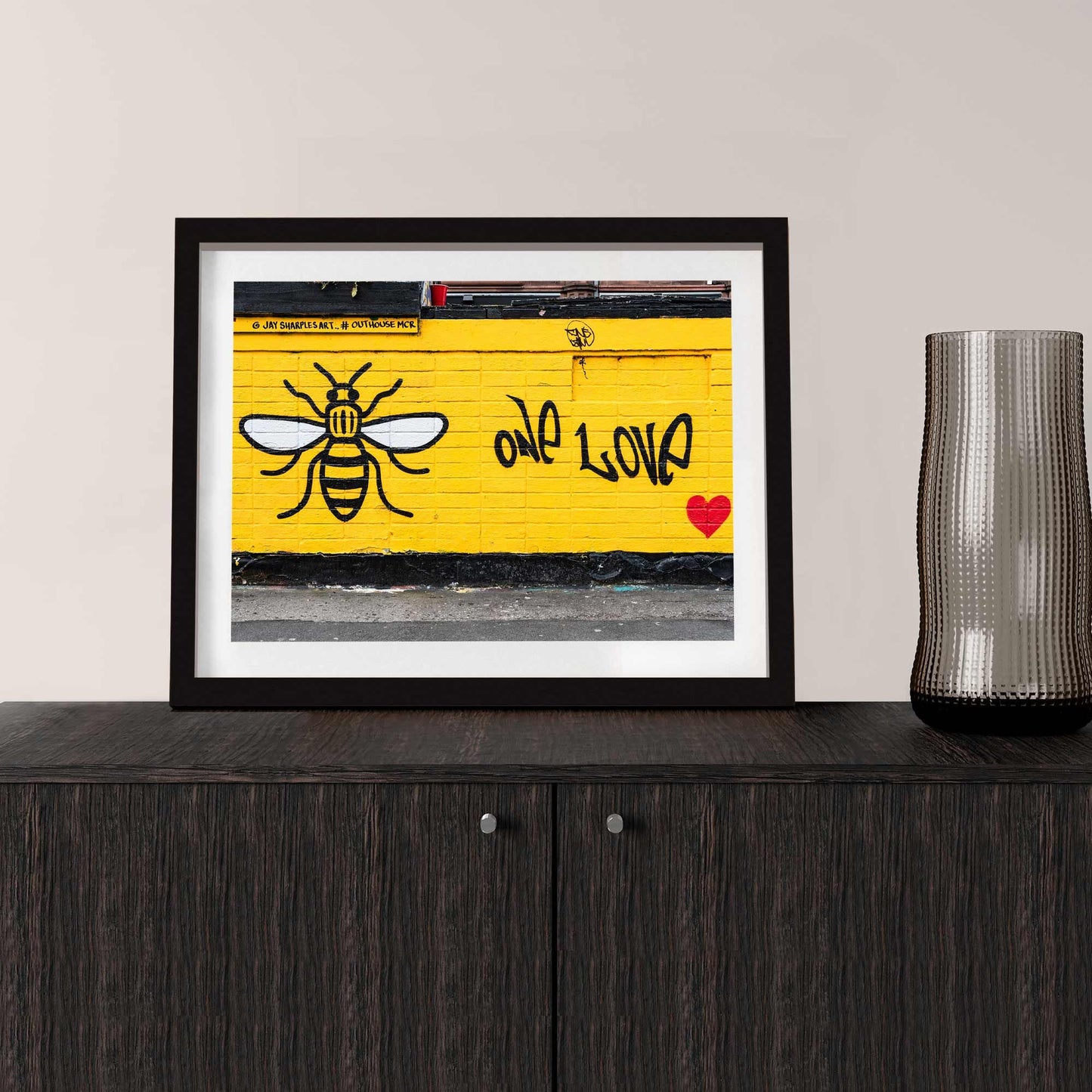Richard Abram Photography - Photographic print of One Love Manchester Bee Mural Street Photograph, taken in Manchester, England, UK.