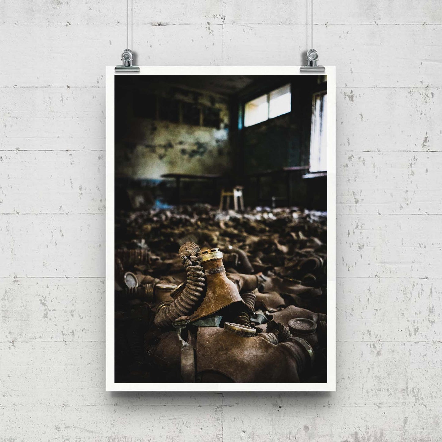 Richard Abram Photography - Photographic print of urbex photography taken in Pripyat, Chernobyl, Ukraine.
Image shows gas masks covering the floor.