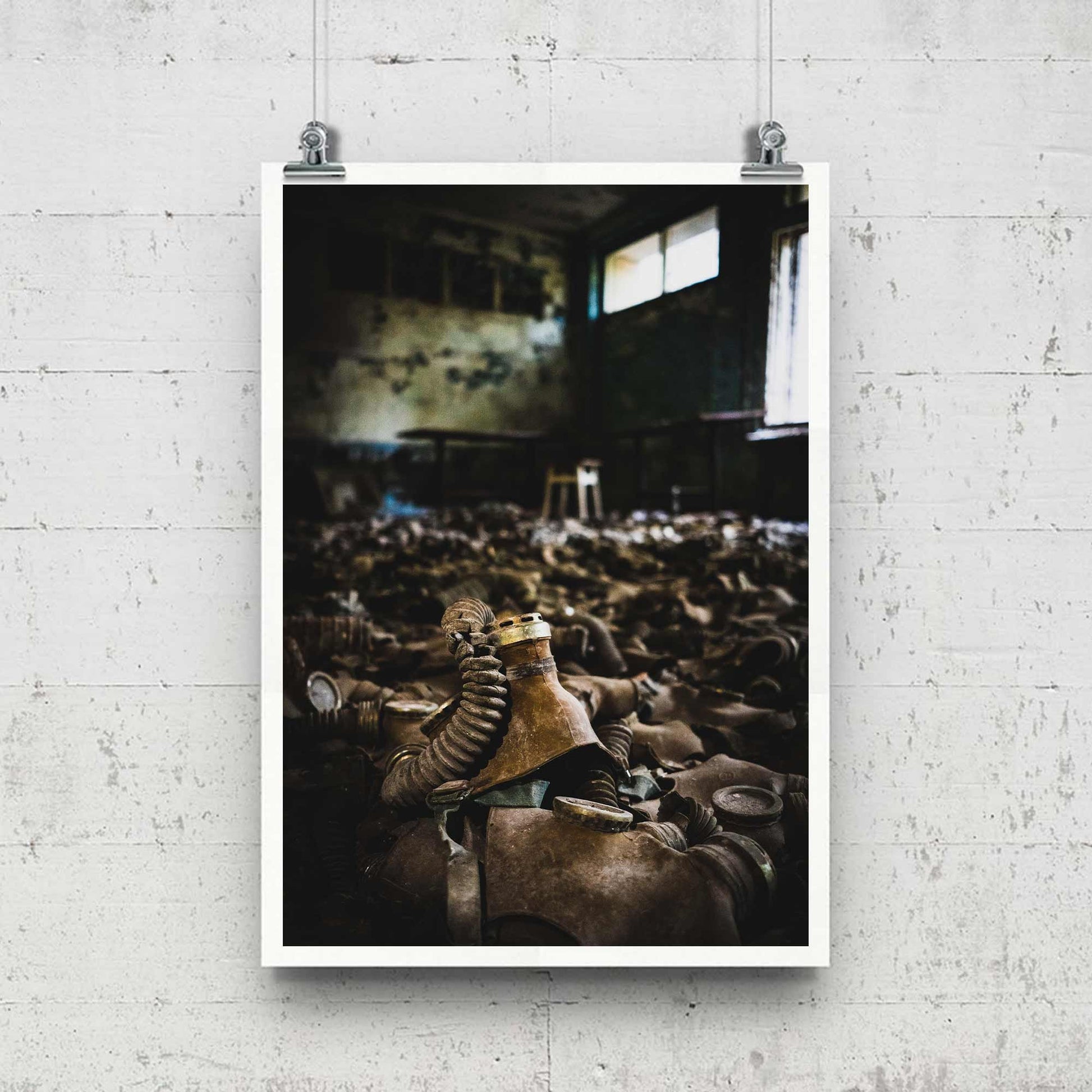 Richard Abram Photography - Photographic print of urbex photography taken in Pripyat, Chernobyl, Ukraine.
Image shows gas masks covering the floor.