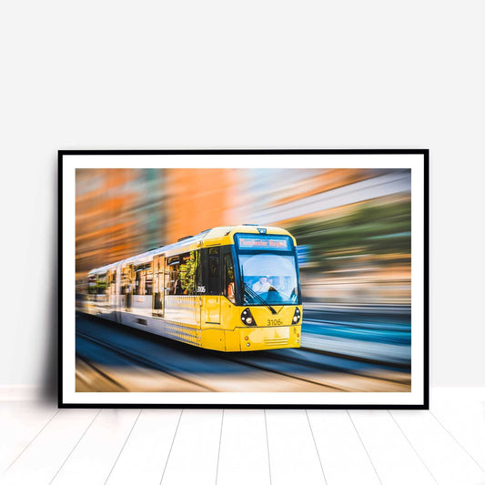 Richard Abram Photography - Photographic print of Manchester Tram with motion blur effect making the tram look like it is speeding, taken in Manchester, England, UK.