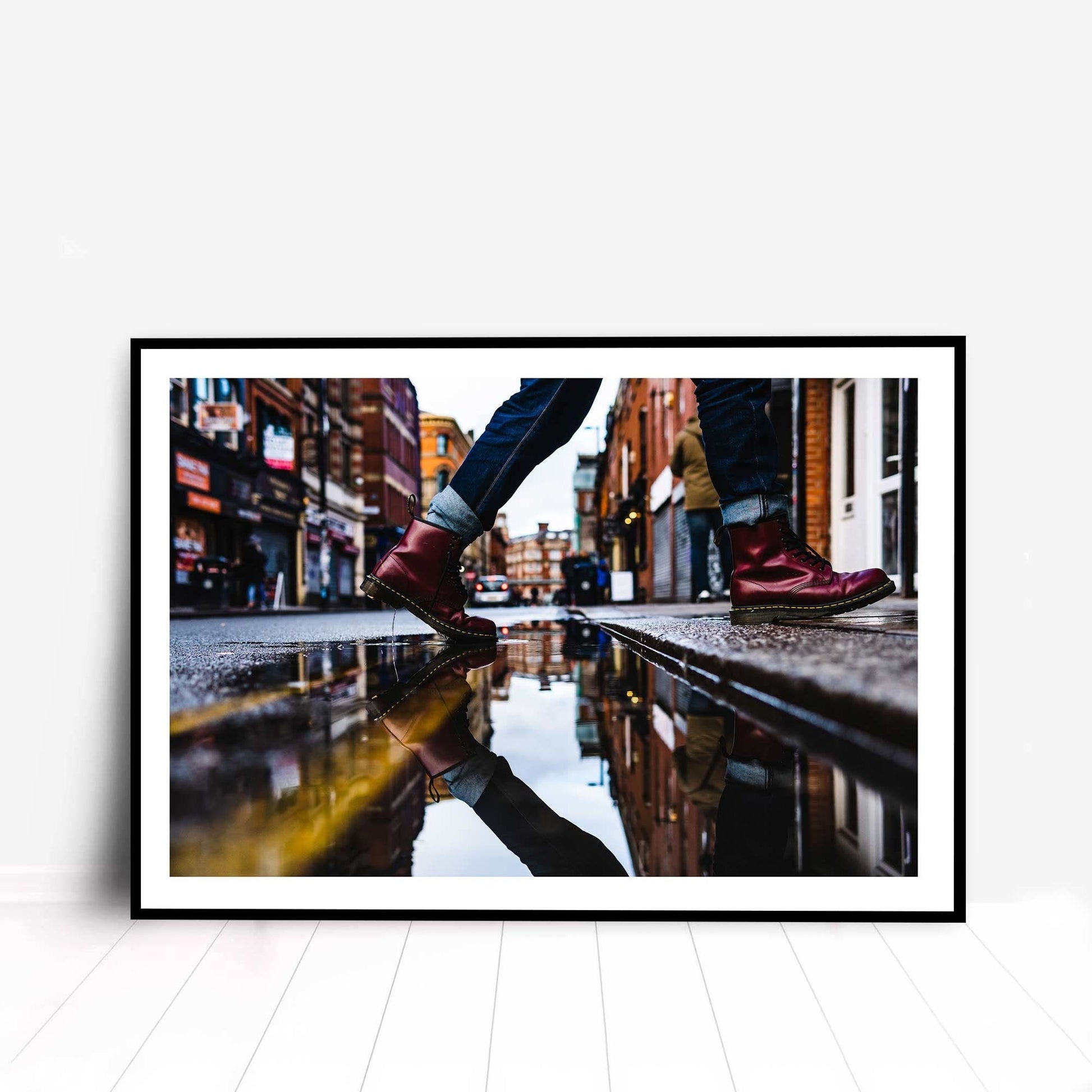 Richard Abram Photography - Street Photography Red Boots Reflection in a puddle with yellow lines leading into the distance. Digital Photography Fine Art Print A4, A3, A2