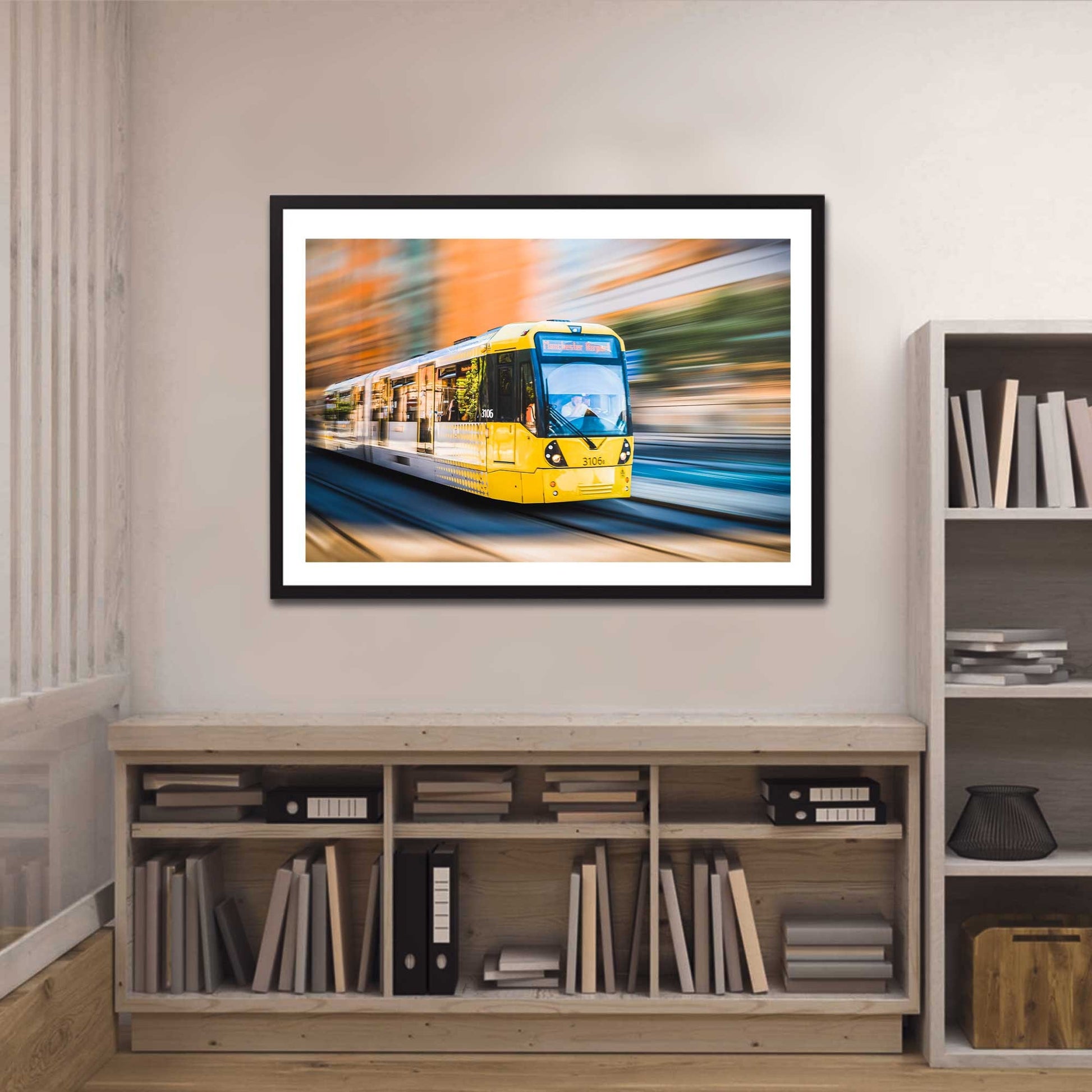 Richard Abram Photography - Photographic print of Manchester Tram with motion blur effect making the tram look like it is speeding, taken in Manchester, England, UK.