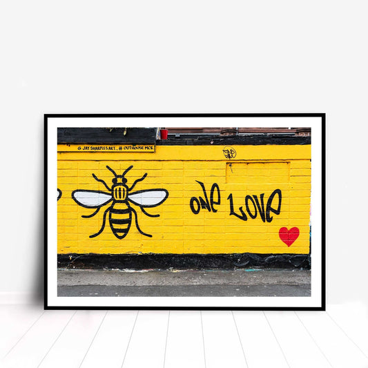 Richard Abram Photography - Photographic print of One Love Manchester Bee Mural Street Photograph, taken in Manchester, England, UK.
