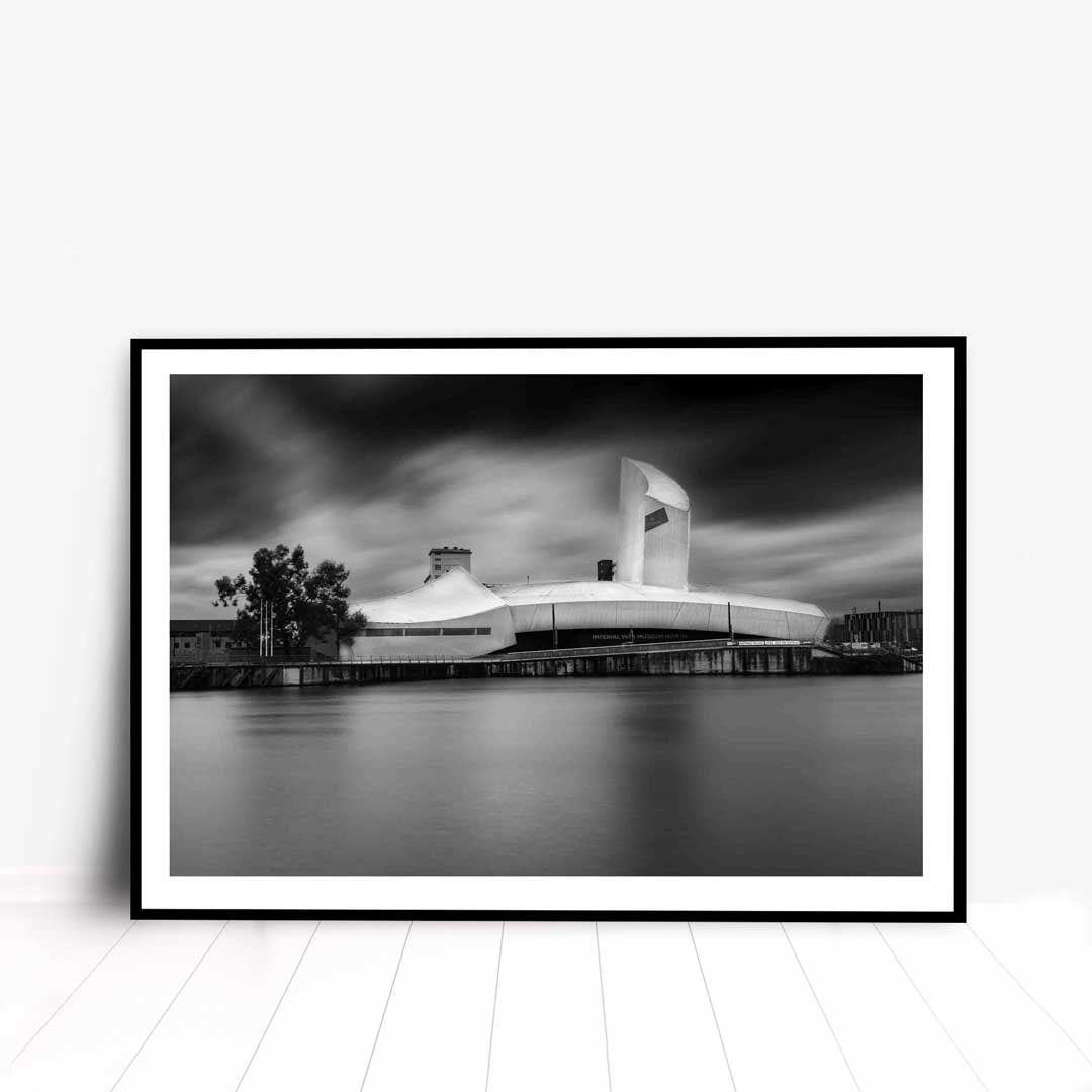 The image is of the Imperial War Museum North. It was photographed on a very windy day. The background of the image shows cloud movement thanks to this process.